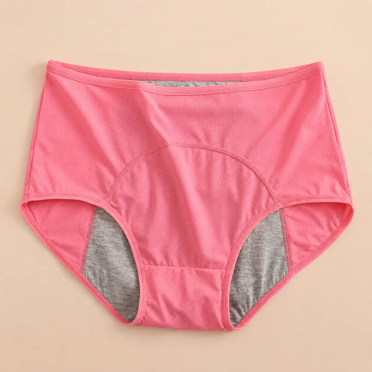 Pink leak-proof incontinence underwear for women, flat lay front view